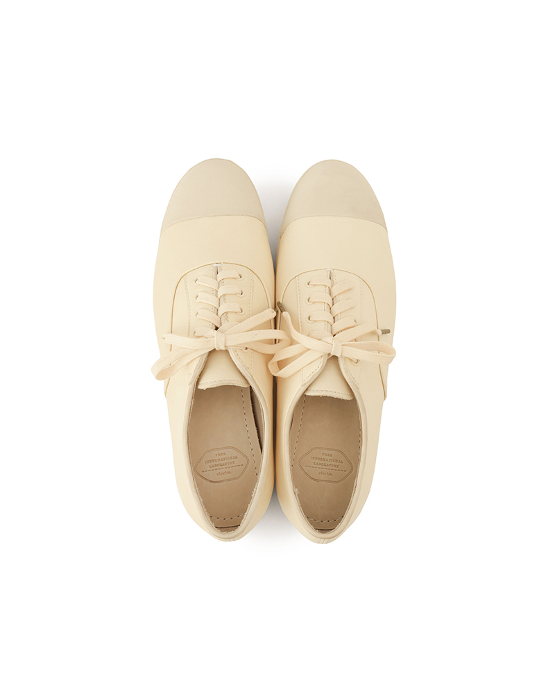 P.T.U. TRAINER W IVORY W6